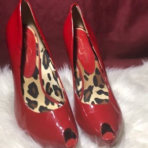 Red patent leather heels by Jessica Simpson